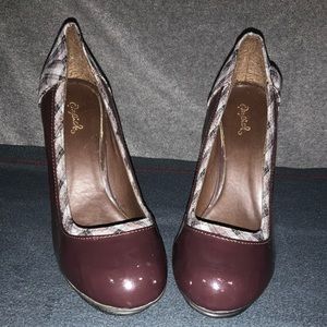 Brown patent leather pumps